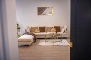 Cozy 1BR with Private Balcony, Gym, Pool & Workspace